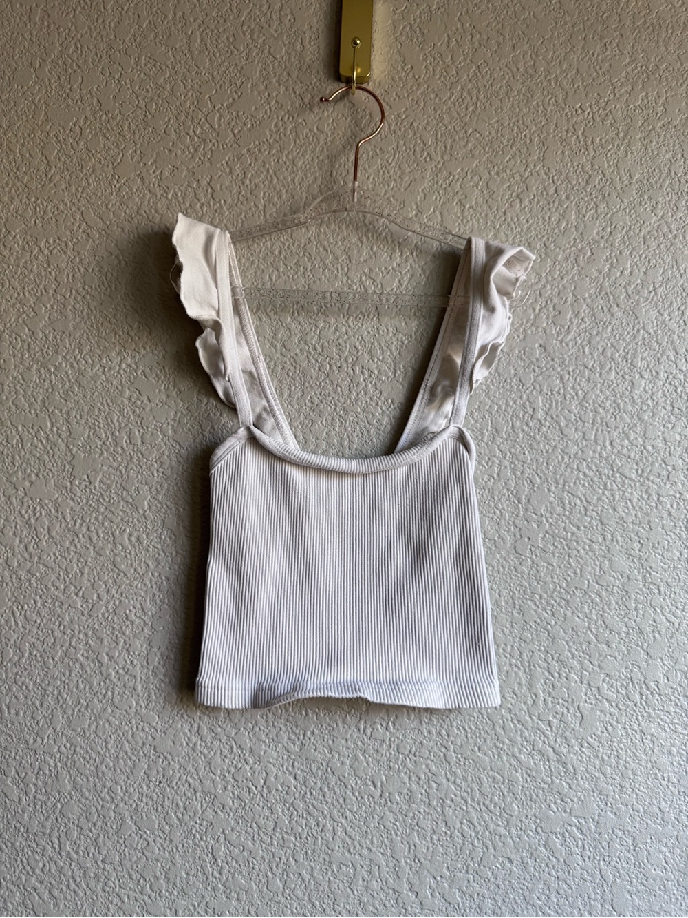 Free People ribbed white cropped top with ruffle straps and a square neckline.